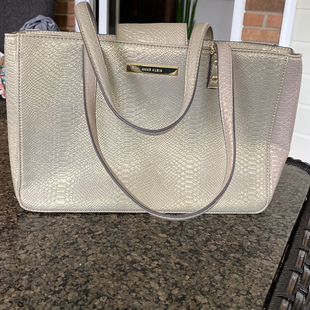 Anne Klein purse Gold tone snap close zip center multiple interior.